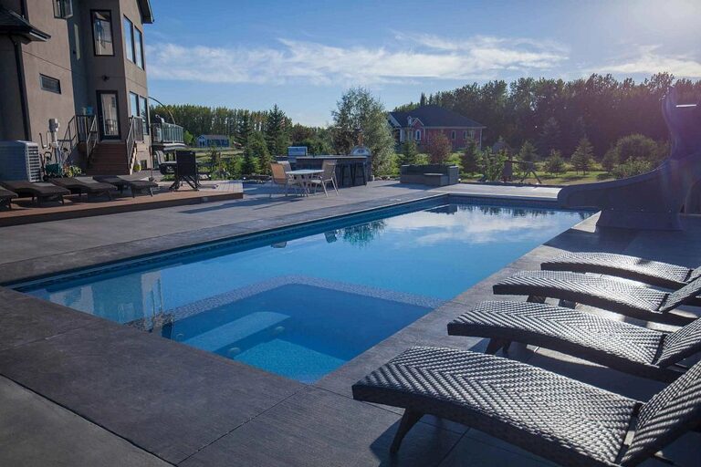 Astoria fiberglass pool, slide. Installed by B Cool Pools in central Oklahoma.