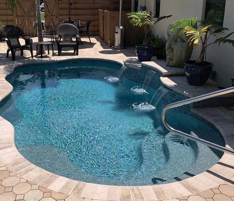 Latham Aruba fiberglass pool, Shale Gray gel coat — manufacturer product photo. B Cool Pools installs this model across central Oklahoma.