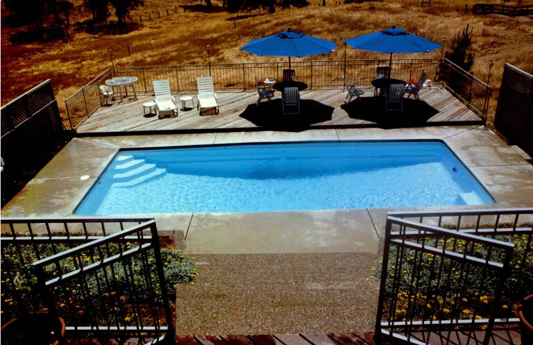 Latham Delray fiberglass pool — manufacturer product photo. B Cool Pools installs this model across central Oklahoma.